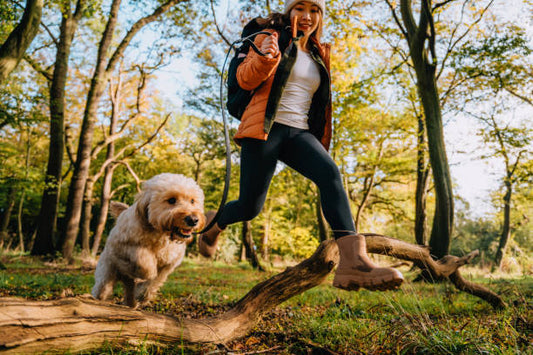 Woman hiking with dog cover blog image
